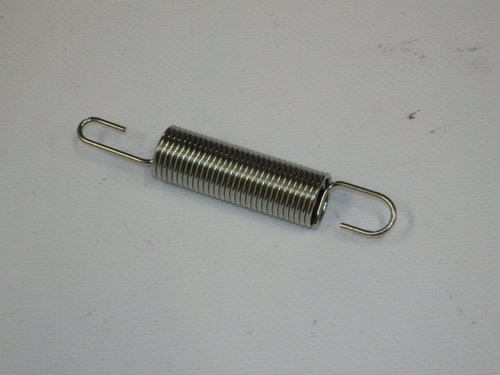 Cutter belt brake tension spring